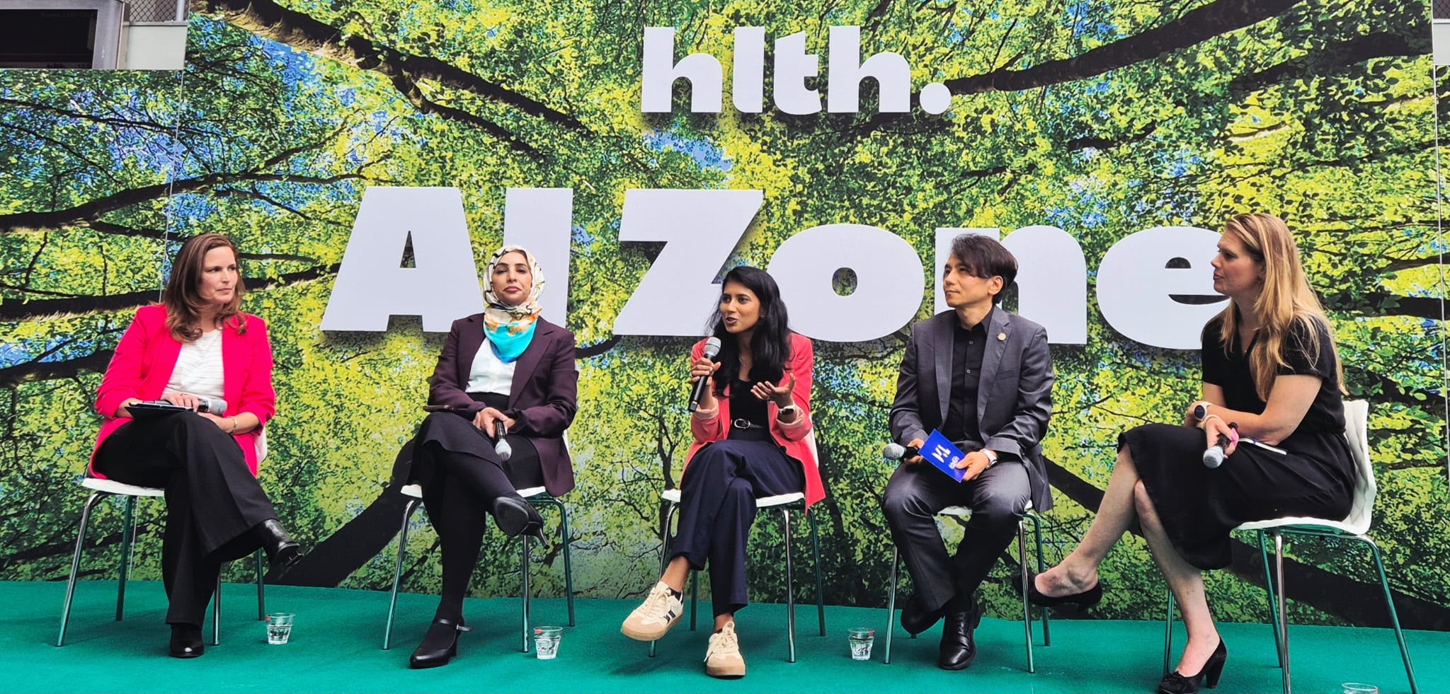 Dr. Manasi Aichmüller-Ratnaparkhe speaking on the data equity panel at HLTH Europe's AI Zone